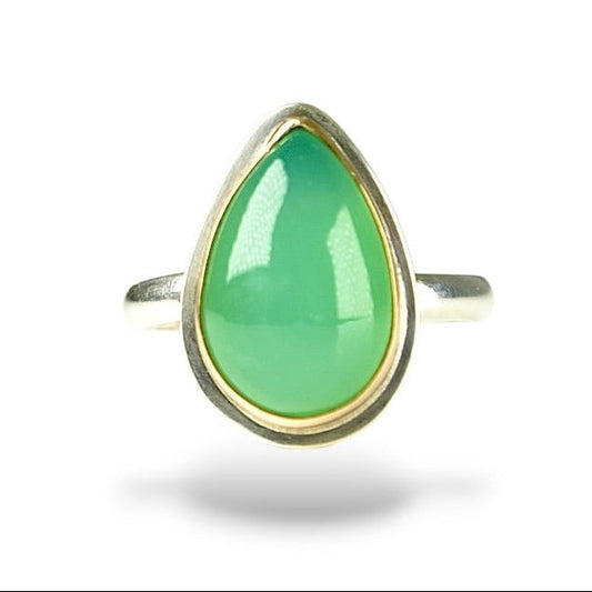 A teardrop-shaped Australian Chrysoprase gemstone set in a 14k gold filled bezel with sterling silver band, against a white background.